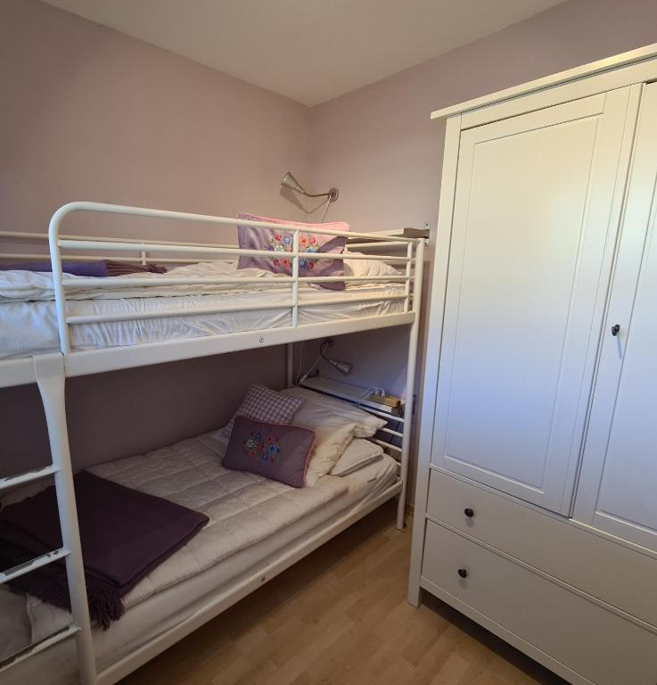 Postel nebo postele na pokoji v ubytování Haus Deichgraf Whg 3