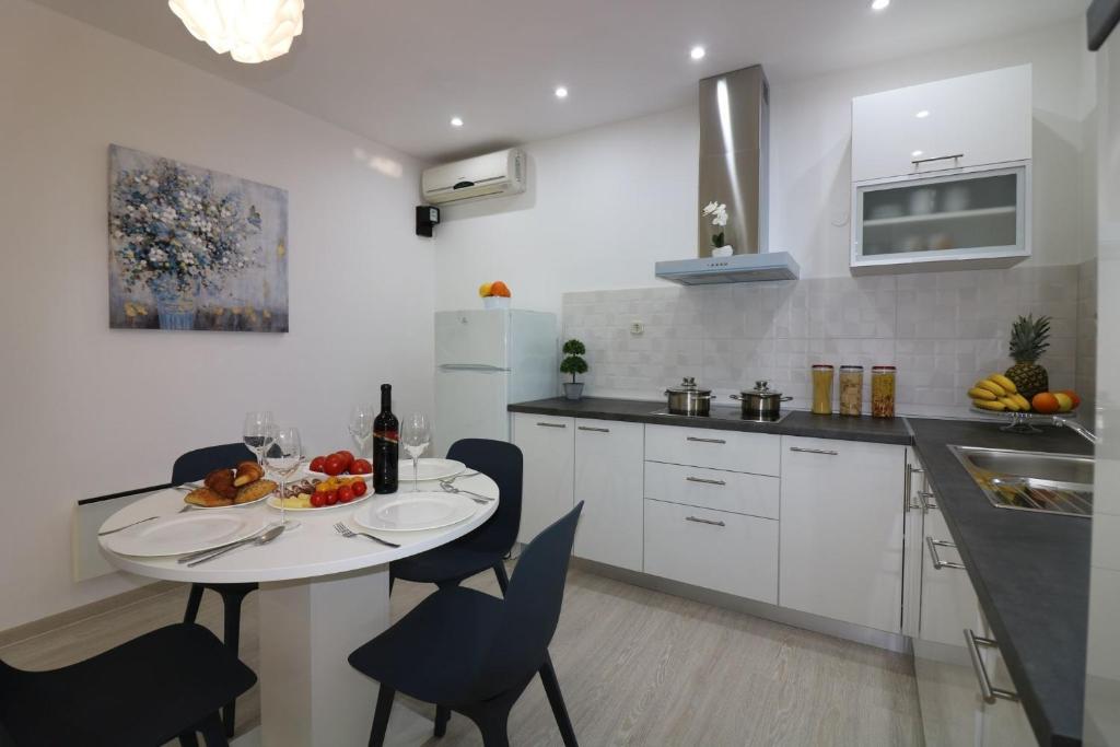 Kuchyň nebo kuchyňský kout v ubytování Bungalow Melisa 7