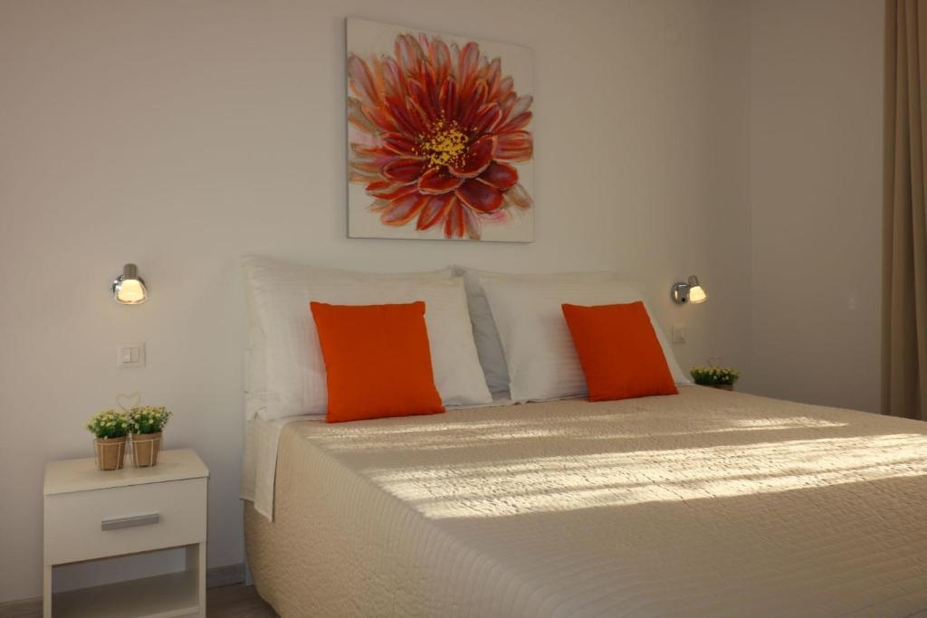 Łóżko lub łóżka w pokoju w obiekcie Residence Lorena Bungalow Lavanda 1