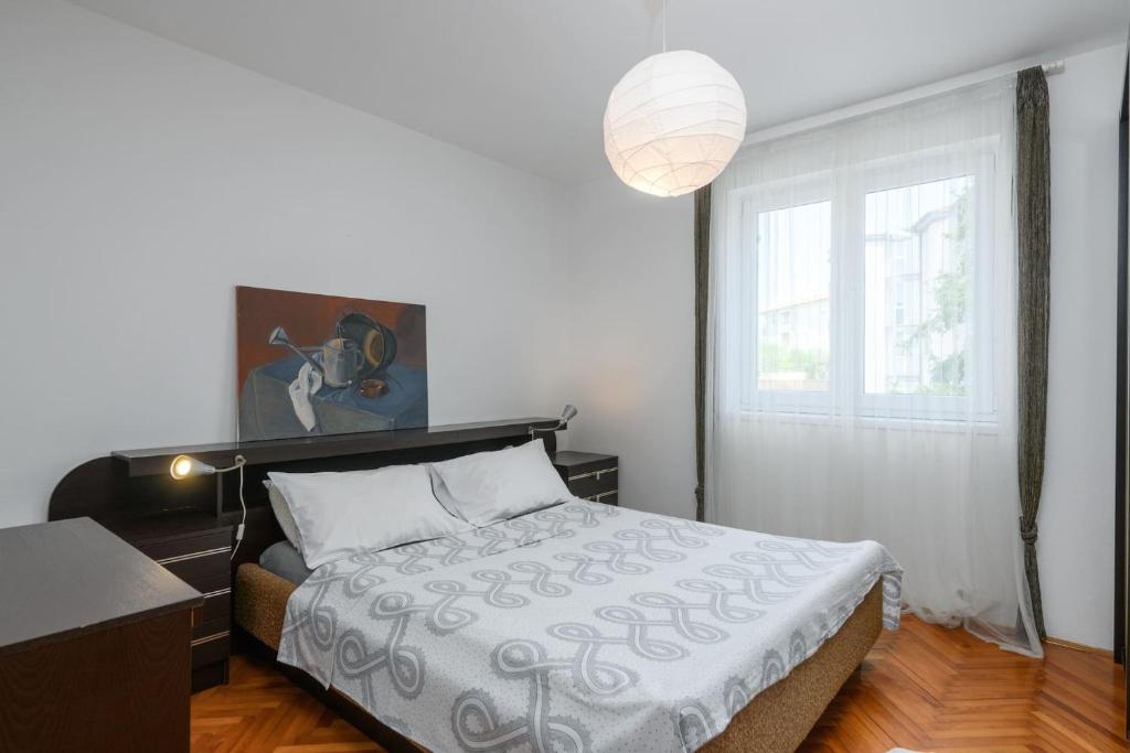 Łóżko lub łóżka w pokoju w obiekcie Villa Monte Magno