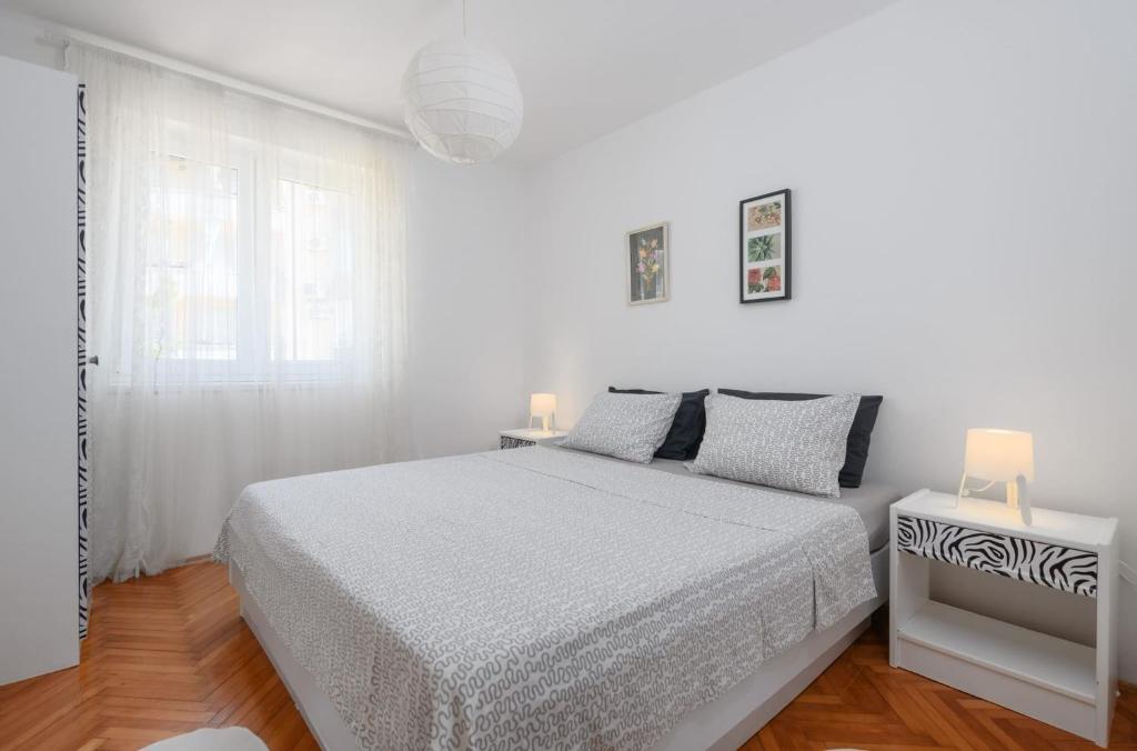 Łóżko lub łóżka w pokoju w obiekcie Villa Monte Magno