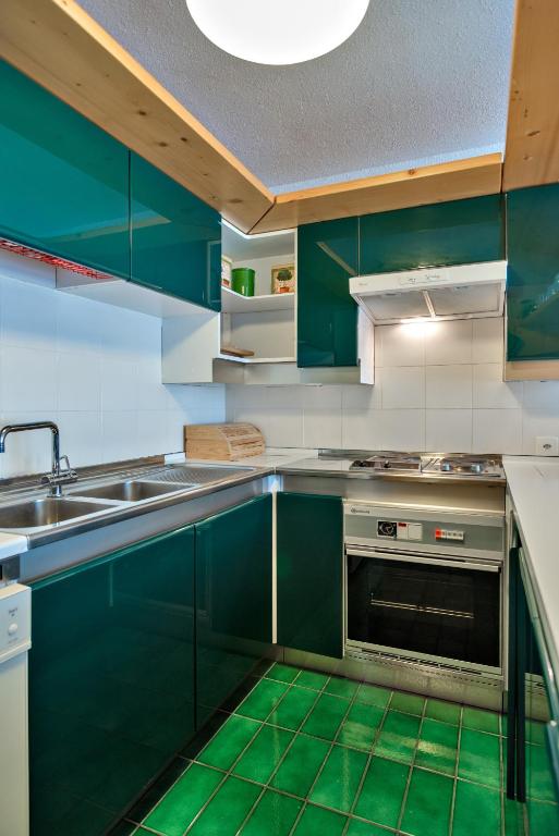 Kuchyň nebo kuchyňský kout v ubytování Silva House - Champfèr