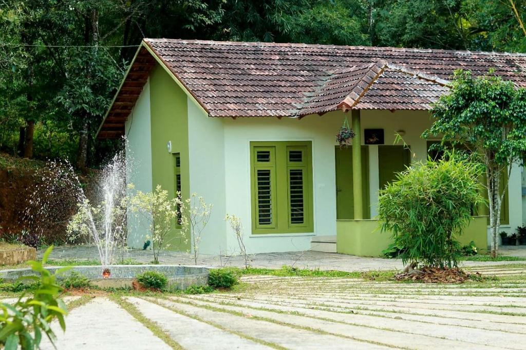 Zahrada ubytování Ayurnest Pool Resort Wayanad