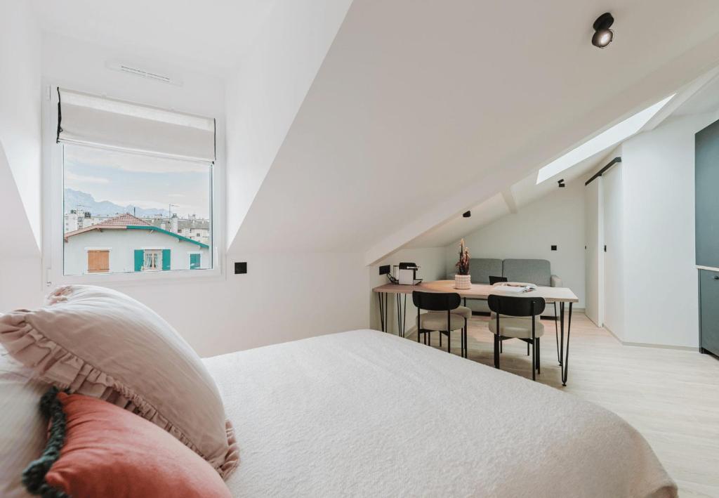 Postel nebo postele na pokoji v ubytování Appart Hotel Neostelia