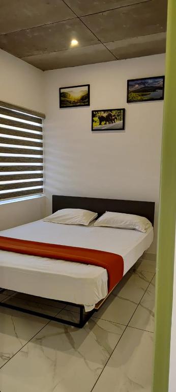 Postel nebo postele na pokoji v ubytování Ayurnest Pool Resort Wayanad