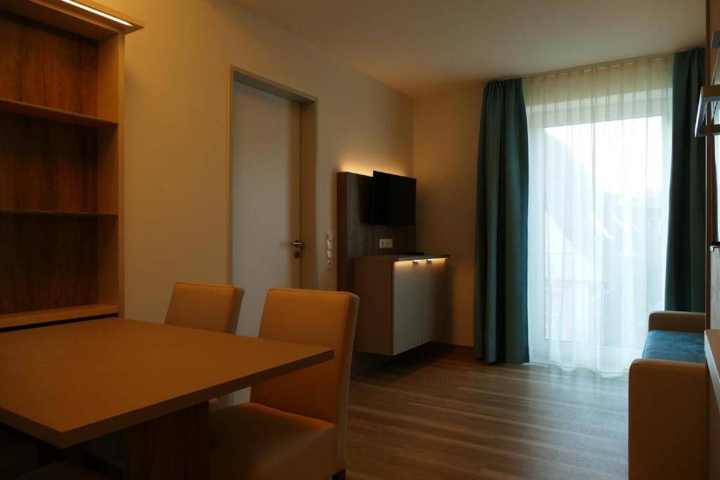 TV a/nebo společenská místnost v ubytování Meyn's Apartments