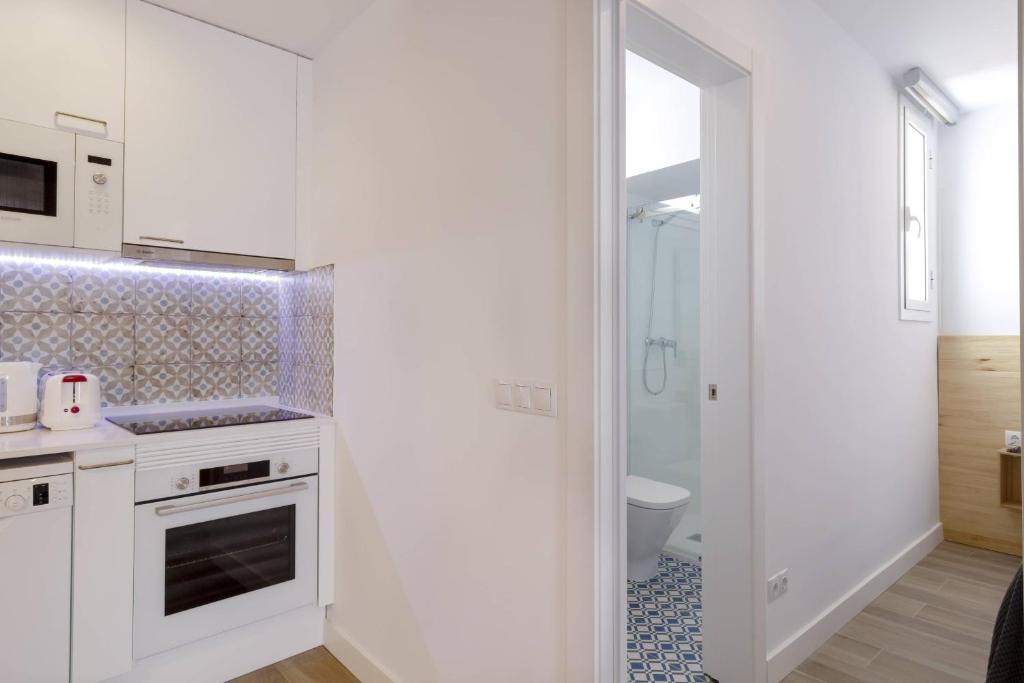 A kitchen or kitchenette at Ola Living Camp Nou