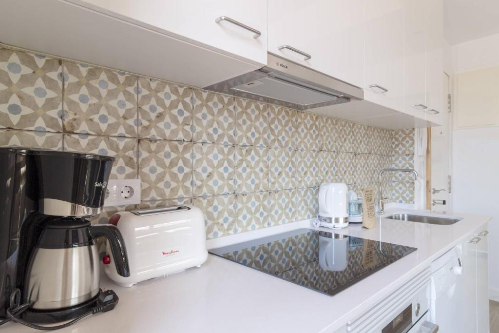 A kitchen or kitchenette at Ola Living Camp Nou