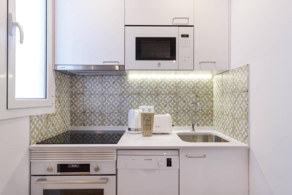 A kitchen or kitchenette at Ola Living Camp Nou