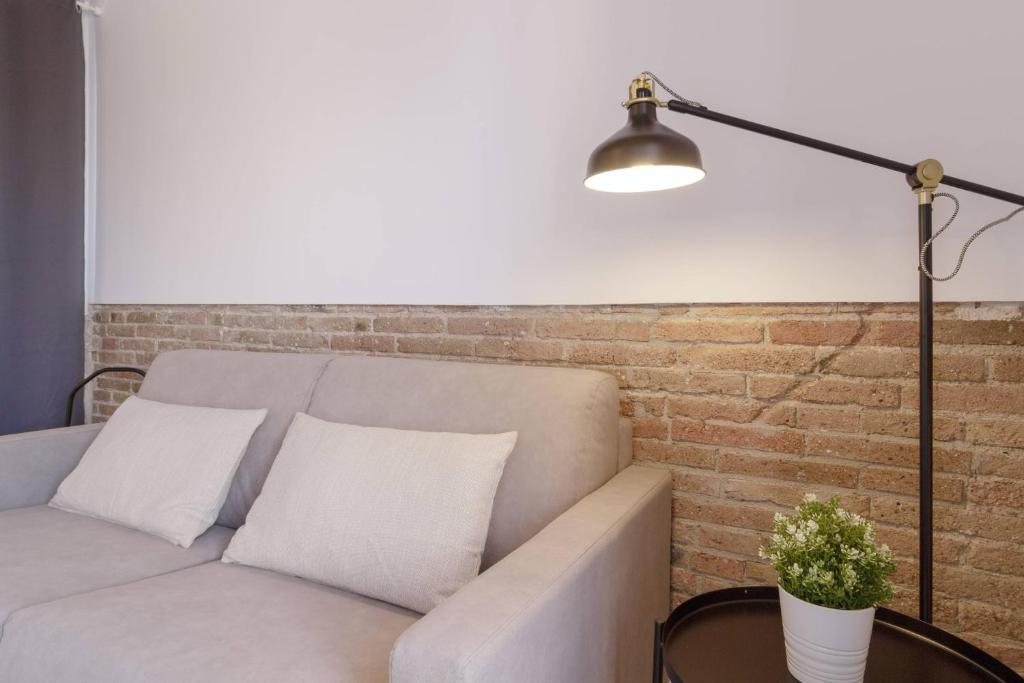 A seating area at Ola Living Camp Nou