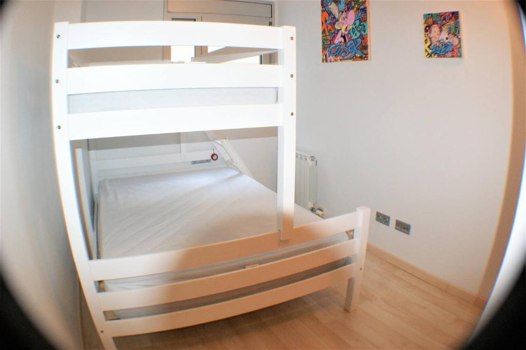 Posteľ alebo postele v izbe v ubytovaní Atico-duplex moderno en en el centro de Roses AV-65