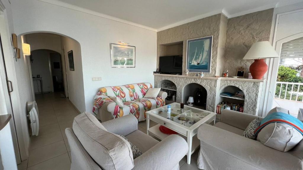 Televízia a/alebo spoločenská miestnosť v ubytovaní Apartamento Casa Linda con vistas espectaculares AV-40