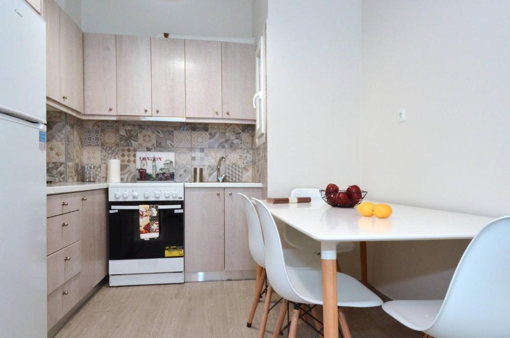 Kuchyňa alebo kuchynka v ubytovaní Patisia, a minimal apartment