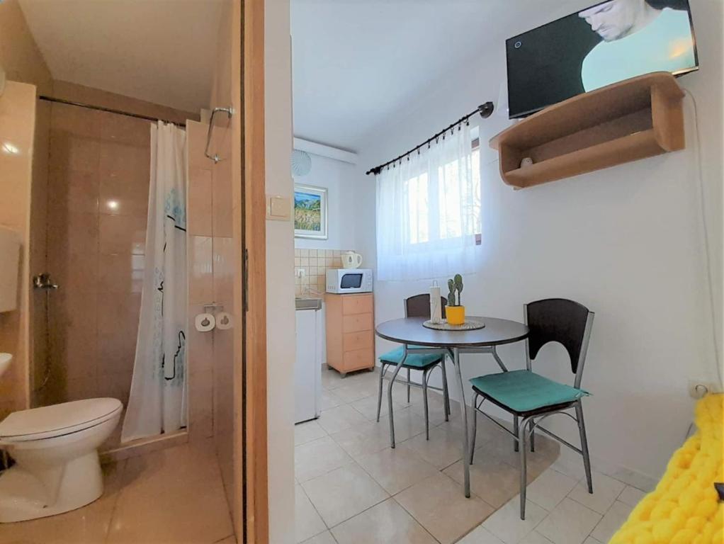 Koupelna v ubytování Lovely Studio Malina close to the Beach