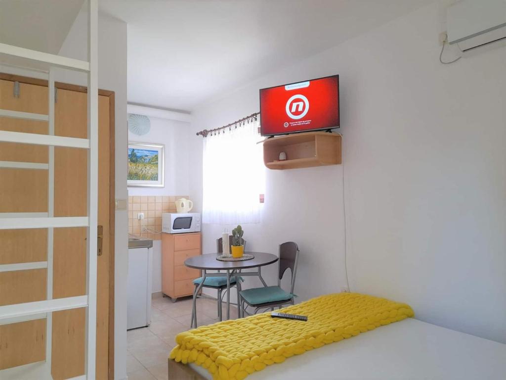 Kuchyň nebo kuchyňský kout v ubytování Lovely Studio Malina close to the Beach