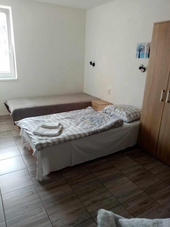 Postel nebo postele na pokoji v ubytování Ivachnová 84