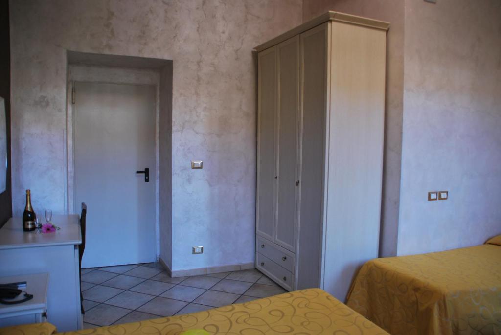 A bed or beds in a room at Appartamenti Valdocco