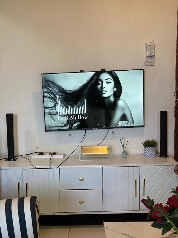 a flat screen tv sitting on a wall at bamburi studio in Mombasa
