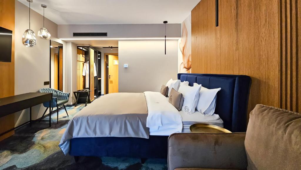 Postel nebo postele na pokoji v ubytování Hotel Bucura
