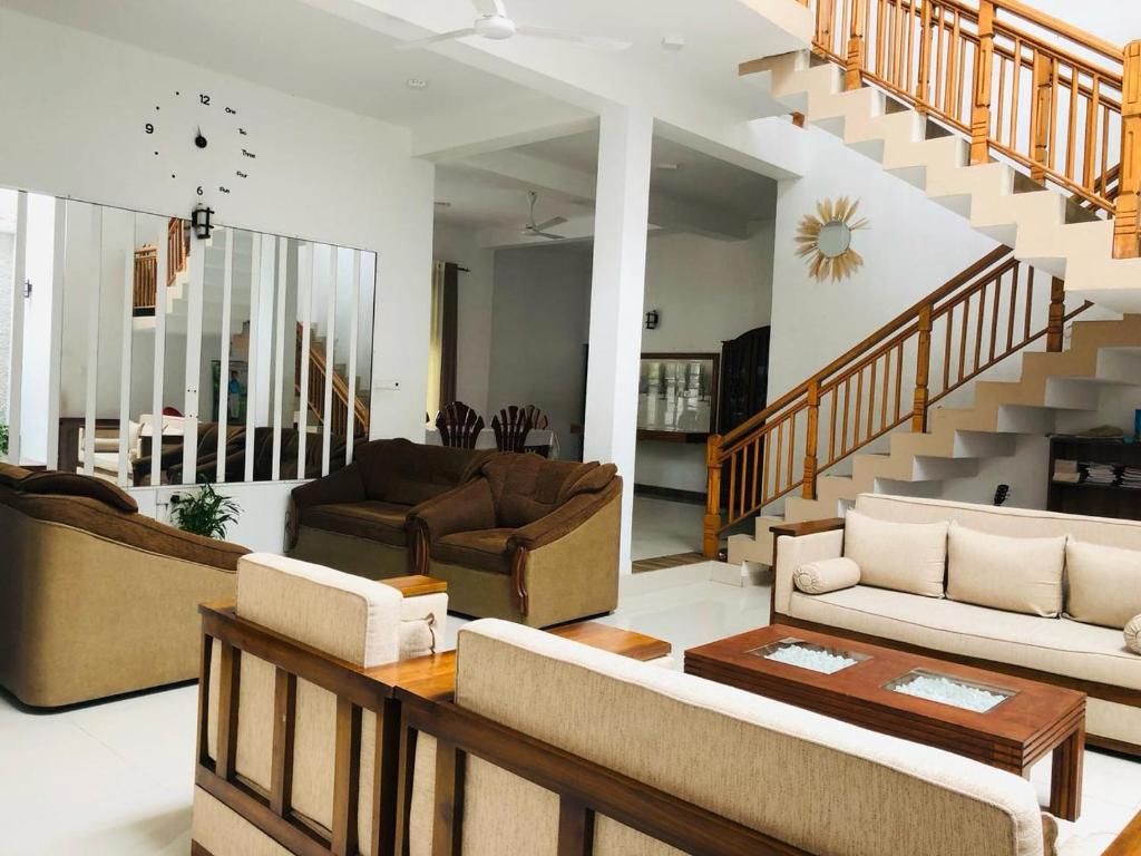 Posezení v ubytování White Square Home-stay