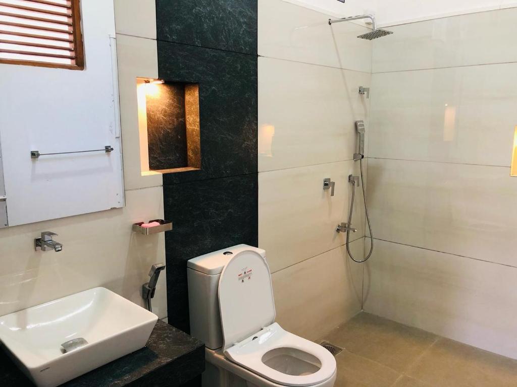 Koupelna v ubytování White Square Home-stay