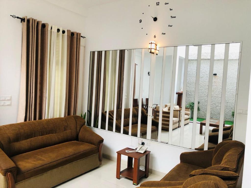 Posezení v ubytování White Square Home-stay