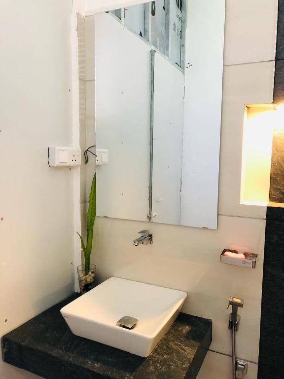 Koupelna v ubytování White Square Home-stay