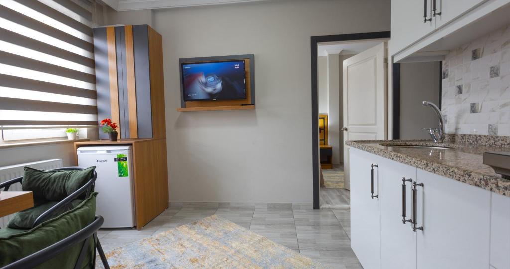 Kuchyň nebo kuchyňský kout v ubytování Ayyıldız Pansiyon Apart