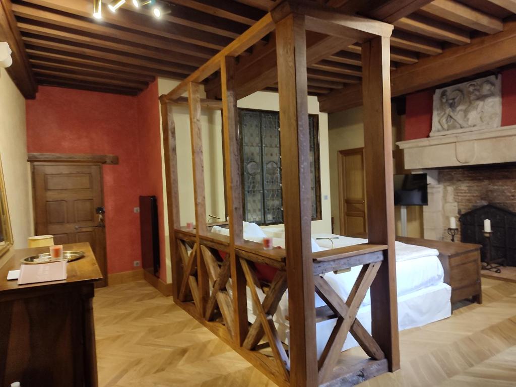 TV a/nebo společenská místnost v ubytování Gite, chambre d hôte L échoppe est belle