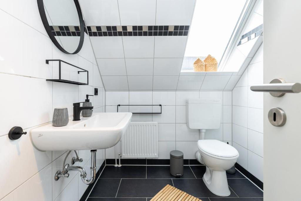 Koupelna v ubytování Appartement Tina Kieler Straße 16a APPARTO Grömitz