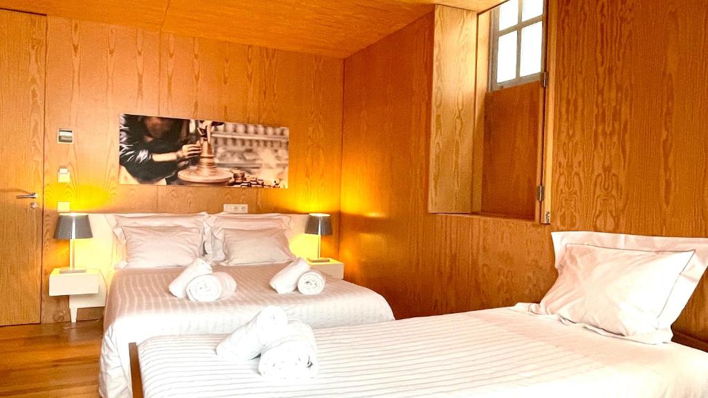 Postel nebo postele na pokoji v ubytování Arc My Otel