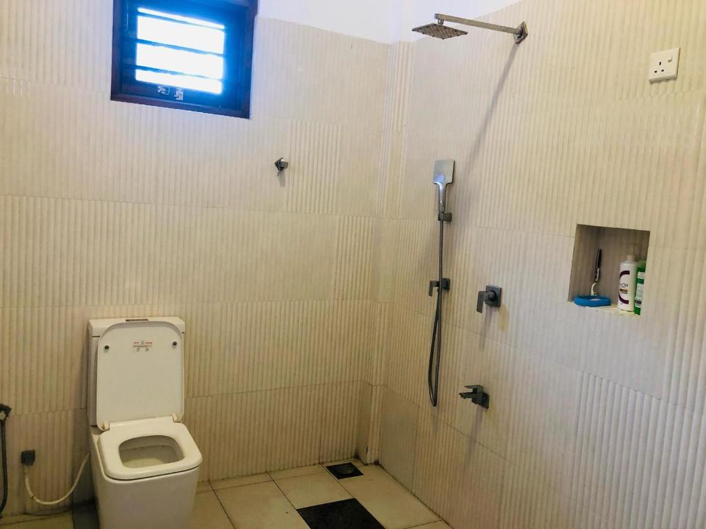 Koupelna v ubytování White Square Home-stay