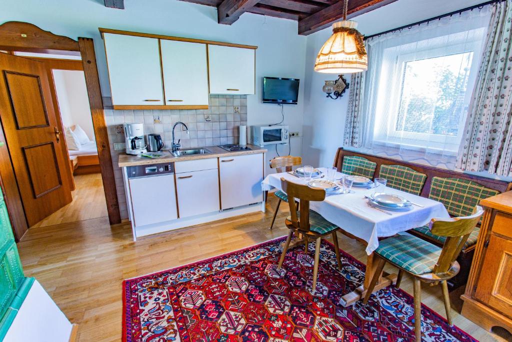 Kuchyň nebo kuchyňský kout v ubytování Soldanella 2 by Alpenidyll Apartments