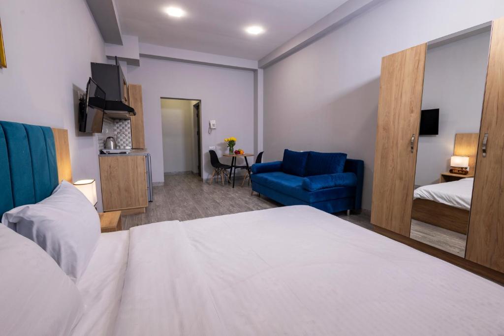 Postel nebo postele na pokoji v ubytování Horizon Hotel Yerevan