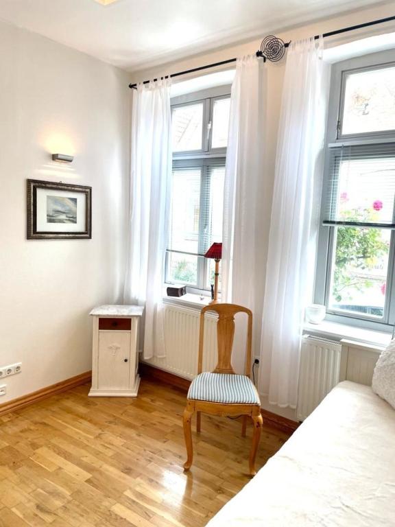 Postel nebo postele na pokoji v ubytování Fischerhuus