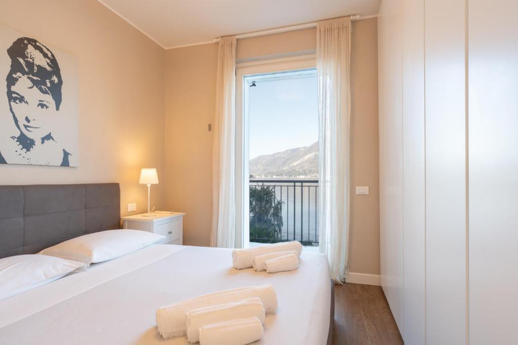 A bed or beds in a room at La Roseta