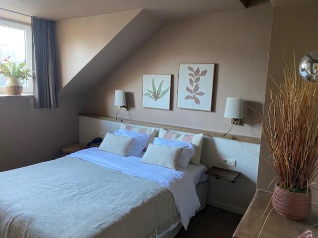 Postel nebo postele na pokoji v ubytování Hotel Louisa