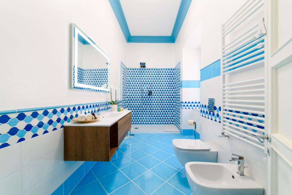 Koupelna v ubytování Sirenuse Home & Suites