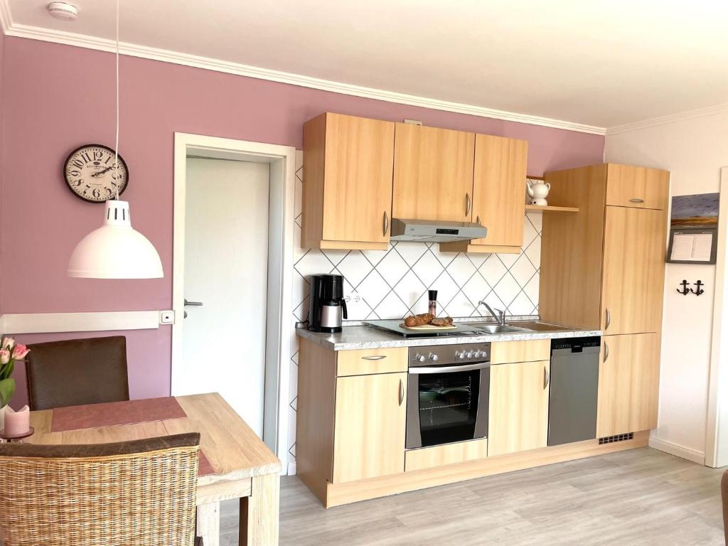 Kuchyň nebo kuchyňský kout v ubytování Ferienwohnung Dünennest