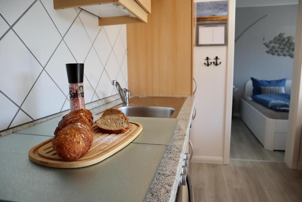Kuchyň nebo kuchyňský kout v ubytování Ferienwohnung Dünennest