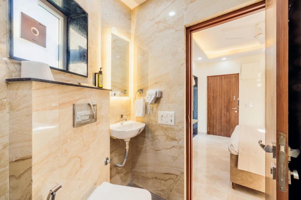 Koupelna v ubytování Kyomi Service Apartments