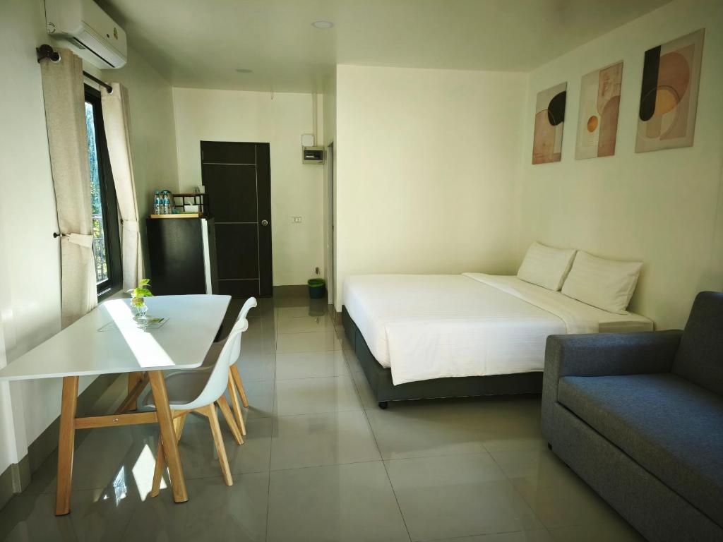 Un ou plusieurs lits dans un hébergement de l'établissement The Secret Garden Homestay Koh Yao Yai