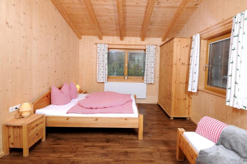 Postel nebo postele na pokoji v ubytování Maries Ferienhaus MAY-100