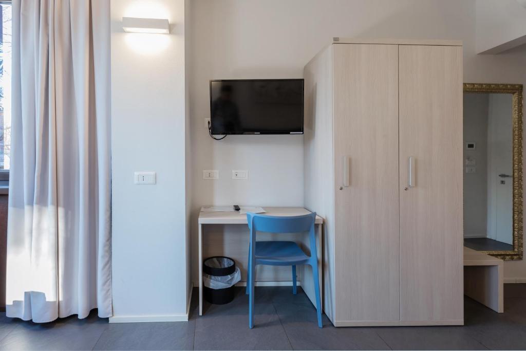TV a/nebo společenská místnost v ubytování StraVagante Hostel & Rooms