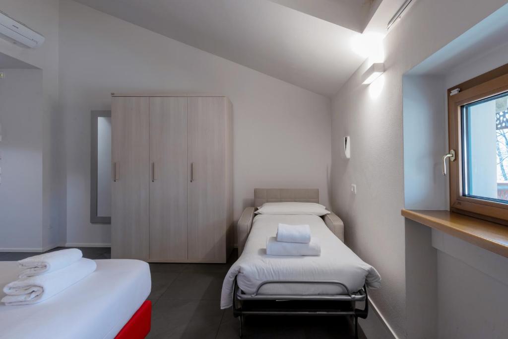 Postel nebo postele na pokoji v ubytování StraVagante Hostel & Rooms