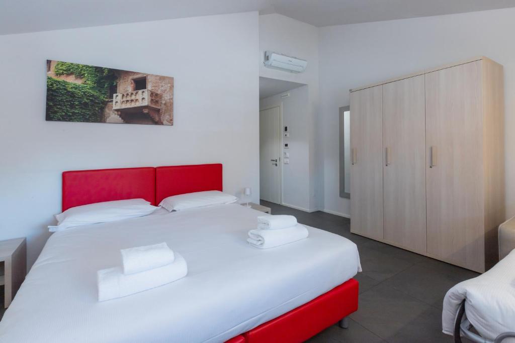 Postel nebo postele na pokoji v ubytování StraVagante Hostel & Rooms