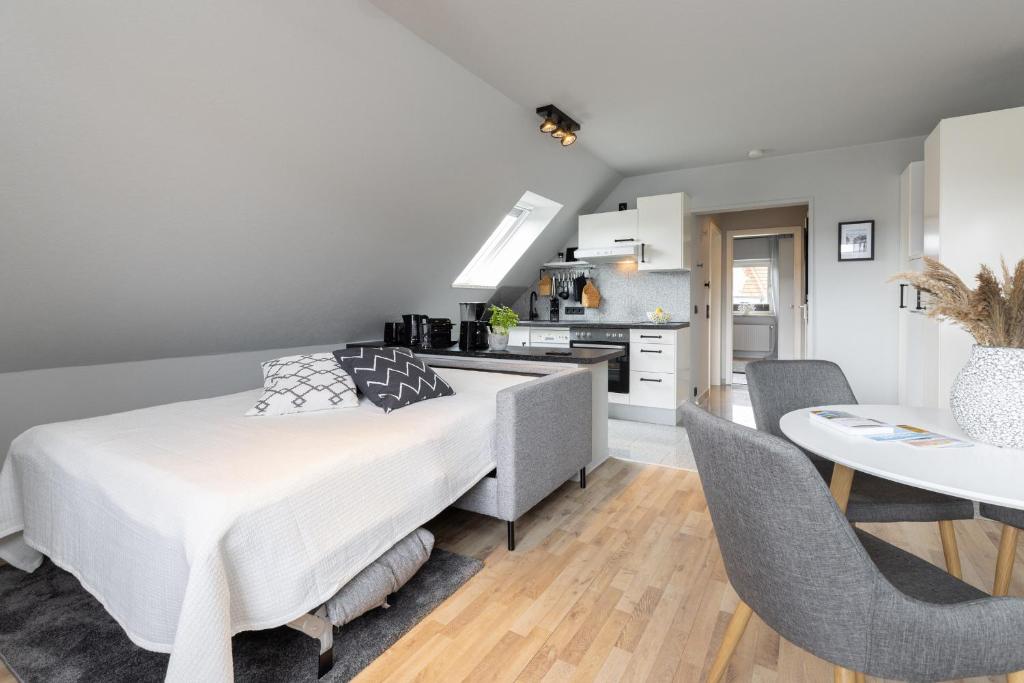Kuchyň nebo kuchyňský kout v ubytování Appartement Nele Kieler Straße 16a APPARTO Grömitz