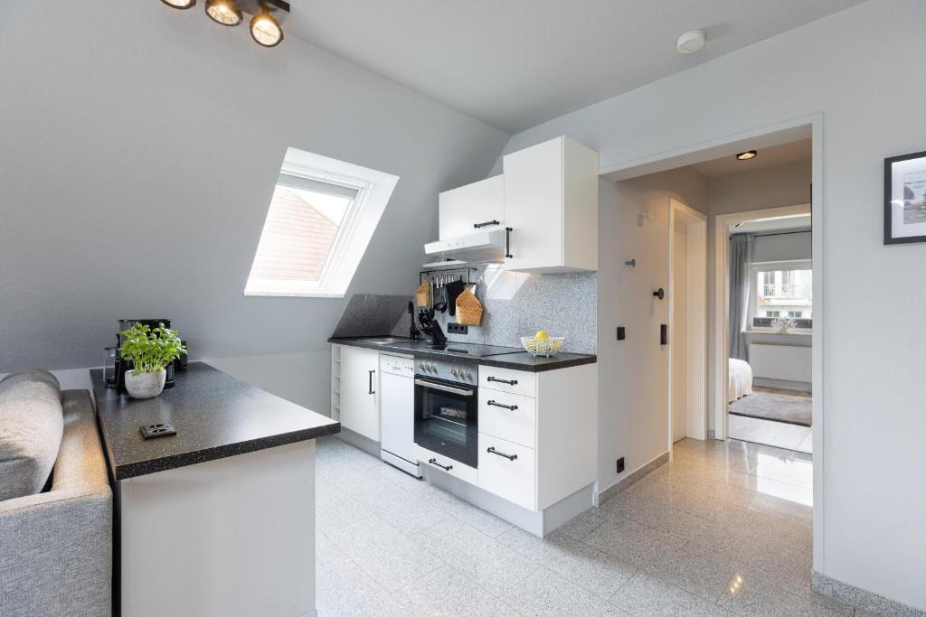Kuchyň nebo kuchyňský kout v ubytování Appartement Nele Kieler Straße 16a APPARTO Grömitz