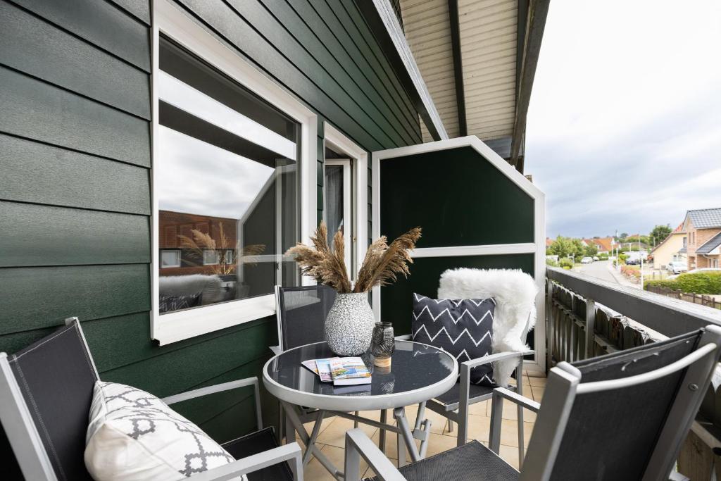 Posezení v ubytování Appartement Nele Kieler Straße 16a APPARTO Grömitz