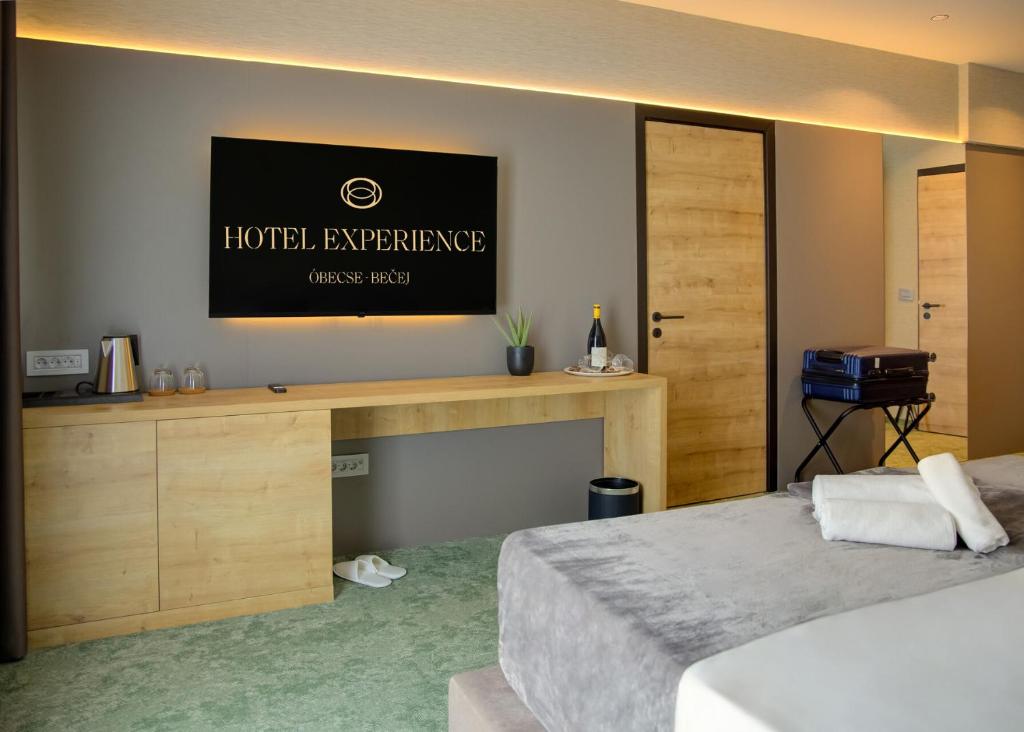 Postel nebo postele na pokoji v ubytování Hotel Experience